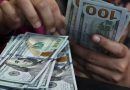 Dollar holds near two-month peak as yields rise, Fed data looms