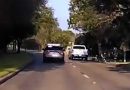 Suspect caught on dashcam video throwing cash out the window