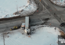 Ontario transport truck driver charged in collision with ambulance in Madoc