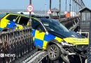 Police car wedged over sea after ploughing through Ryde Pier railings