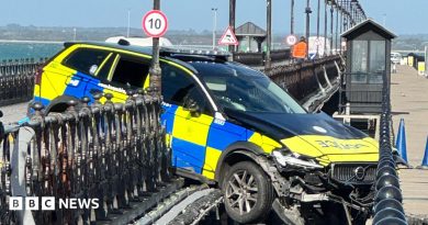 Police car wedged over sea after ploughing through Ryde Pier railings