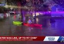 Neighbors work together to escape rising floodwaters