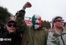 Drumcree: Kneecap visit Garvaghy Road to show support for residents