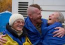 Evacuees reunite with family at the Ukrainian-Belarusian border after fleeing Oleshky