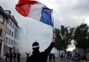 More than 400,000 protest across France, challenging Macron as Paris clashes erupt